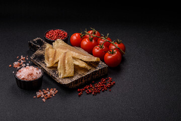 Dried salted fish, snacks or jerky, slices of white fish fillets