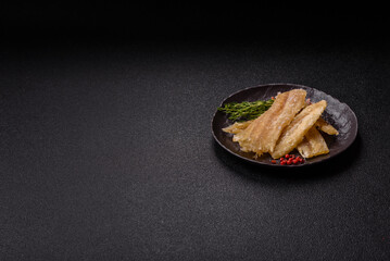 Dried salted fish, snacks or jerky, slices of white fish fillets