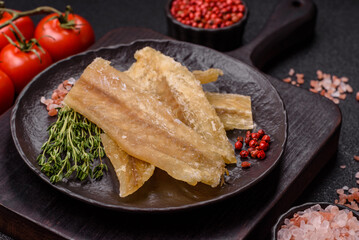 Dried salted fish, snacks or jerky, slices of white fish fillets