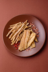 Dried salted fish, snacks or jerky, slices of white fish fillets
