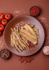 Dried salted fish, snacks or jerky, slices of white fish fillets