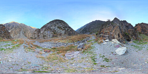 Full Spherical panorama of dry rocky riverbed in mountain ravine in equirectangular projection