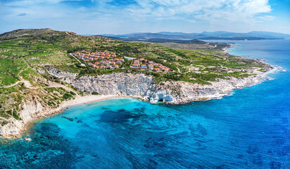 aerial panoramic view of a stunning beach featuring turquoise waters and striking white cliffs along the coast of Mediterranean sea