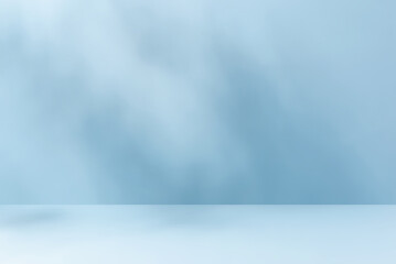 Minimalistic abstract gentle light blue background for product presentation with aesthetic light...