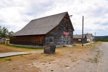 Obraz premium Stables and livery of the Fort Steele Heritage Town in the East Kootenay region of southeastern British Columbia, Canada
