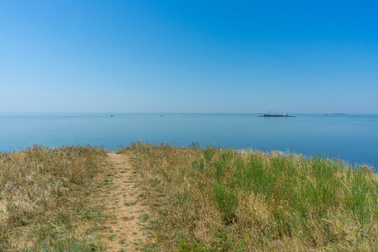 Incredible panoramic sea views from Cape Adzhiyask, located near the village of Rybakivka in the Mykolaiv region of Ukraine, offering a serene coastal landscape and natural beauty. - Powered by Adobe