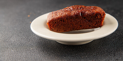 Financier biscuit chocolate cookie sweet dessert fresh delicious gourmet food background on the table rustic food top view copy space