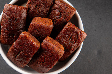 Financier biscuit chocolate cookie sweet dessert fresh delicious gourmet food background on the table rustic food top view copy space