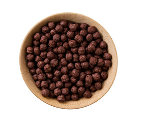 wooden bowl of tasty chocolate corn balls isolated on a white background, top view.