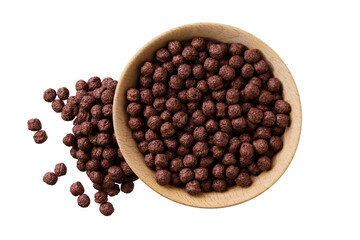 tasty chocolate corn balls pouring out of wooden bowl isolated on white background. Top view.