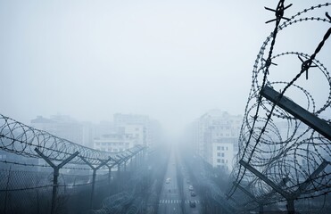 Urban Fog And Barbed Restriction