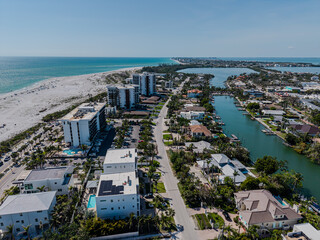 Beautiful aerial view of Sarasota, the magnificent white sand beach, and its iconic St. Armands Circle