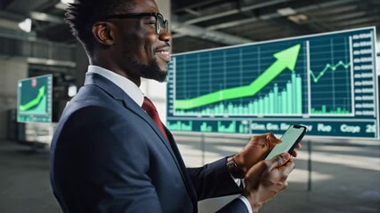 Businessman using smartphone and looking at interactive screen displaying positive growth chart, indicating successful investment strategy and market analysis - Powered by Adobe
