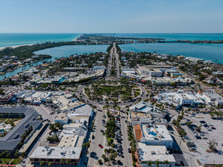 Beautiful aerial view of Sarasota, the magnificent white sand beach, and its iconic St. Armands Circle