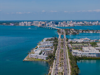 Beautiful aerial view of Sarasota, the magnificent white sand beach, and its iconic St. Armands Circle