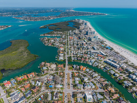 Beautiful aerial view of Sarasota, the magnificent white sand beach, and its iconic St. Armands Circle