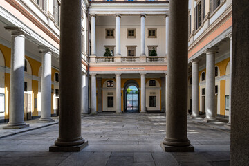 Lugano. Switzerland. Beige Yellow Walls with Arched Windows and Columns.