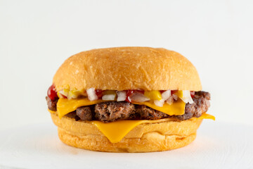 A catalog of burgers in different varieties with potato buns, meat and vegan medallions with lettuce, tomato, bacon, cucumbers, cheddar cheese, and American-style caramelized onions.