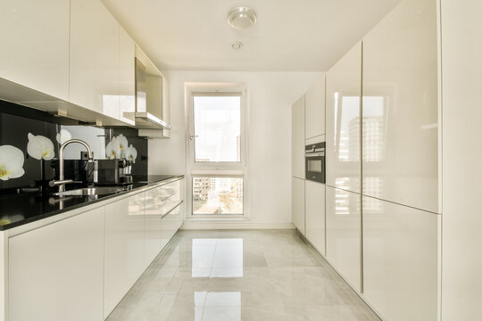 Modern white kitchen with sleek minimalist design