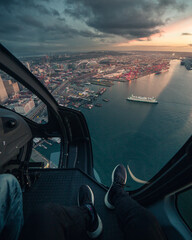 Helicopter flying during sunset 