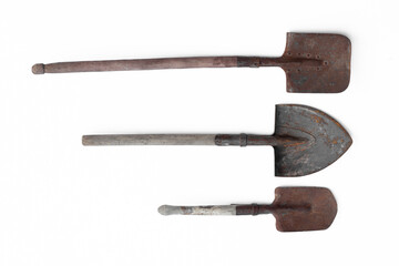 set of old rusty shovels isolated on white background