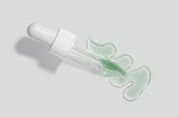 Cosmetic beauty product green nail care oil or cuticle remover. Texture sample stain with pipette...