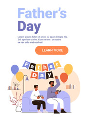 Father and son playing video games celebration living room balloons festive home decor modern website banner