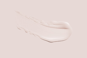 Cosmetic products sample swatch creamy pink texture lip balm or mask smudge grey isolated background