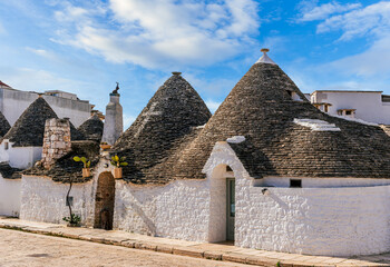 architecture composition of old vintage houses trulli in Italy. Traditional medieval house with...