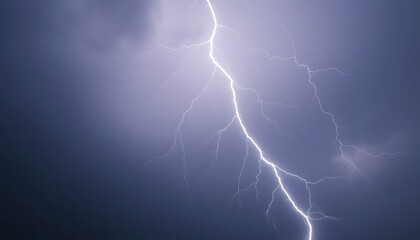 lightning bolt striking through a dark blue sky