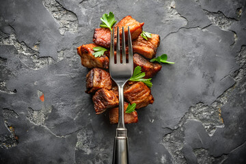 Crispy Pork Belly Bites with Herbs and Fork