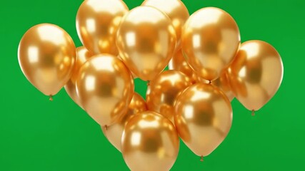 A bunch of shiny gold balloons float against a solid green background - Powered by Adobe