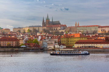 View of Prague landmark and historic buildings along Vltava River in Prague Czech Republic
