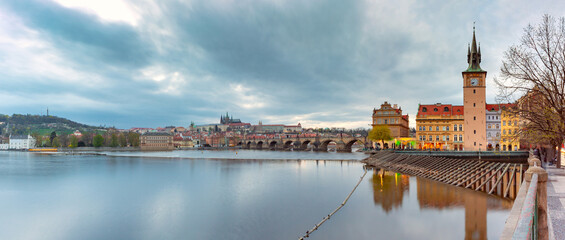 Sunset view of Vltava River with Charles Bridge and landmarks in Prague Czech Republic