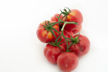 Red cherry tomatoes on a white background isolated on a white background