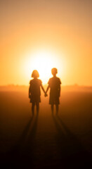 Fototapeta premium A softly focused, wide shot with a warm color palette dominated by oranges and yellows suggestive of either sunrise or sunset. The lighting is dramatic, with a bright light source positioned centrally