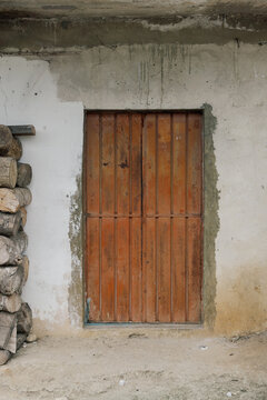 Rustic wooden door in a village