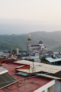 View of a cathedral surrounded by houses 