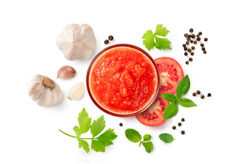 Tomato sauce in glass bowl with spicy and herbs isolated on white background. top view