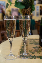Pouring and tasting of dry sparkling wine brut, grand reserve, champagne in Ay-Champagne wine making village in Vallee de la Marne, , Champagne region, France