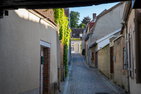 Fototapeta Narrow streets and old houses in grand cru champagne village Ay-Champagne in Marne river valley, France