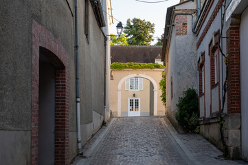 Narrow streets and old houses in grand cru champagne village Ay-Champagne in Marne river valley, France