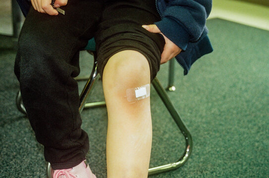 Girl with a Scraped Knee