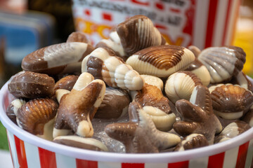 Famous Belgian chocolate candies on display in confectionery shop in Bruges, Belgium