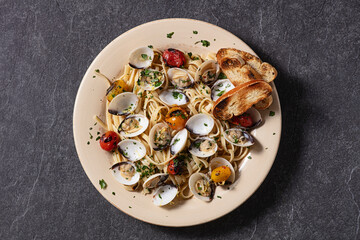 Fresh plate of  Linguini with clams and roasted tomatoes