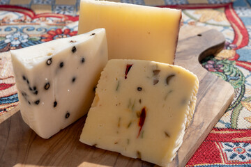Italian provolone cheese made with fresh rocket salad, black pepper, olives, wine, Sicilian cheese, Palermo food