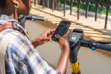 Woman scanning QR code with mobile app