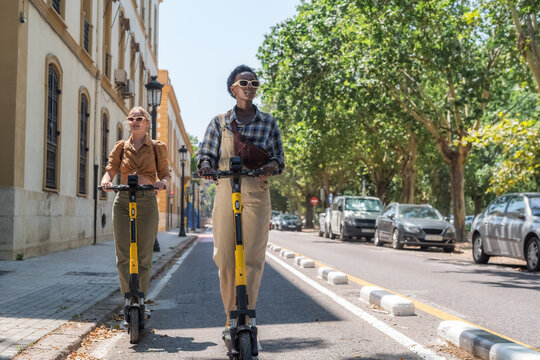 Women enjoying city mobility system