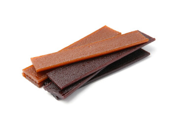 Pieces of delicious fruit leather on white background