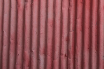 The roof has a wavy texture with a good red color for the background